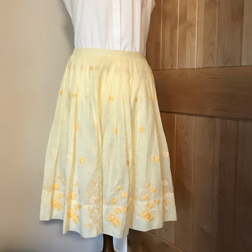Gorgeous light yellow skirt with floral detail